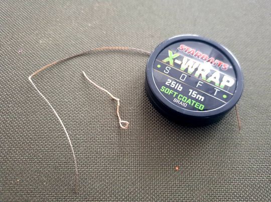 Une tresse complémenté par un coating.